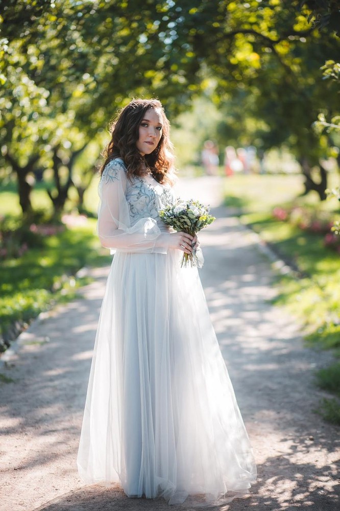 Bride Anastasia in a wedding dress Jenna